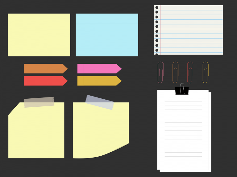 Illustration of various copywriting materials, like a notepad and sticky notes.